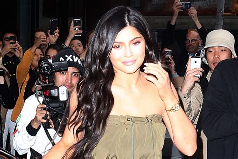 Kylie Jenner Sings ‘Rise and Shine’ in Python Print, Fluffy 